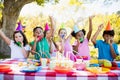Cute children having fun during a birthday party Royalty Free Stock Photo