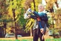 Cute children having fun together in autumn park. Happy brothers walking in nature. Autumn family weekend Royalty Free Stock Photo