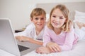 Cute children using a notebook Royalty Free Stock Photo