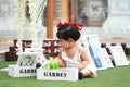 Cute Chinese baby girl play in a garden Royalty Free Stock Photo