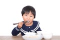 Cute Chinese little girl eating dumplings