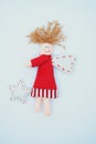 Cute Christmas Angel Made of Fabric Isolated. Composition of Smiling Doll with Wings in Red Dress and Star