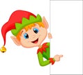 Cute christmas elf cartoon pointing Royalty Free Stock Photo