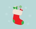 Cute Christmas stocking with gifts and sweets Royalty Free Stock Photo