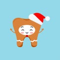 Cute Christmas tooth in gingerbread costume with red santa hat icon in flat cartoon style isolated on background. Royalty Free Stock Photo