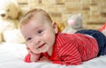 Cute chubby little baby with a happy smile Royalty Free Stock Photo