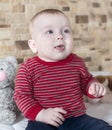 Cute chubby little baby with a happy smile Royalty Free Stock Photo