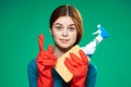 cute cleaning lady rubber gloves detergents green background