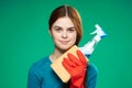 cute cleaning lady rubber gloves detergents green background