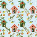 Cute colorful birds and birdhouses seamless pattern.