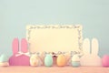 Cute colorful wooden bunny ears and easter eggs over wooden table. Royalty Free Stock Photo