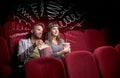 Cute couple in cinema watching movie Royalty Free Stock Photo
