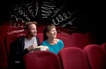 Cute couple in cinema watching movie Royalty Free Stock Photo