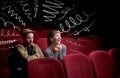 Cute couple in cinema watching movie Royalty Free Stock Photo