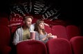 Cute couple in cinema watching movie Royalty Free Stock Photo