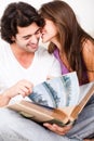 Cute couple embracing in living room