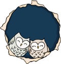 Cute couple owls inside the hole