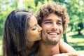 Cute couple relaxing on park bench Royalty Free Stock Photo