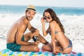Cute couple sitting on the beach Royalty Free Stock Photo