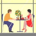 Cute couple sitting at table, drinking tea or coffee and talking. Royalty Free Stock Photo