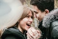 A cute couple of young people in love kissing hugging each other and experiencing tender feelings, Valentine`s Day Royalty Free Stock Photo