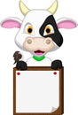 Cute cow cartoon with blank board Royalty Free Stock Photo