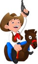 Cute cowboy kid riding Piggy horse toy