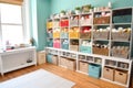 cute craft room with baskets, bins, and bins filled with yarns and fabrics
