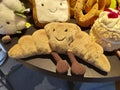 Croissant-shaped plush dolls