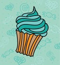 Cute cupcake with blue topping, candy background