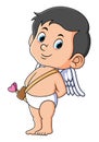 The cute cupid is standing up straight and hiding something