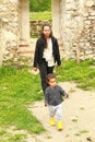 Cute curious boy on old town Dreznik