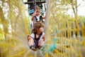 Cute curly child in a rope park Royalty Free Stock Photo