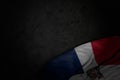 cute dark image of Dominican Republic flag with big folds on black stone with empty space for content - any occasion flag 3d