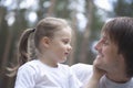 Cute Daughter Touching Father's Face