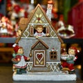 Cute decorative New Year& x27;s house with toy characters for the winter holidays
