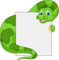 Cute dinosaur cartoon holding blank sign