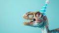 Cute dinosaurios in a bithday hat on pastel green background, copy space Royalty Free Stock Photo