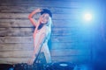 Cute dj woman having fun playing music at club party Royalty Free Stock Photo