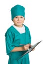 Cute doctor boy with medical clipboard isolated on