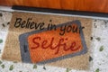 Cute door mat says Believe in your Selfie Royalty Free Stock Photo