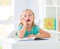 Cute dreaming little girl at school Royalty Free Stock Photo