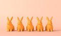 Cute easter bunnny background. Line of colourful rabbits. 3D Rendering Royalty Free Stock Photo