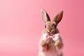 Cute Easter Bunny presenting a gift card - stock picture