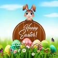 Cute Easter bunny with a wooden sign and colorful eggs in the garden