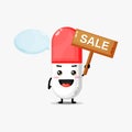 Cute eggplant mascot with the sales sign