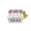 Cute eggs. White eggs with cute faces in carton box. Chicken eggs friends with funny faces. Flat style vector