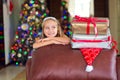 Cute elegant girl celebrate Christmas and New Year with presents Royalty Free Stock Photo