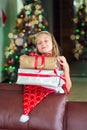 Cute elegant girl celebrate Christmas and New Year with presents Royalty Free Stock Photo