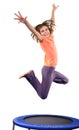 Cute elementary girl jumping and dancing over white Royalty Free Stock Photo